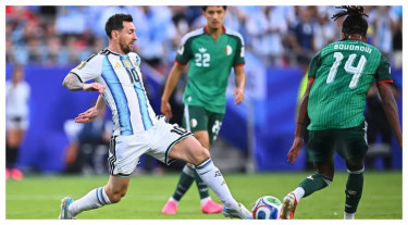 Messi strike gives Argentina halftime lead over Algeria