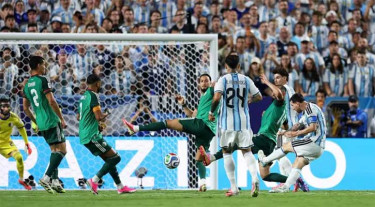 Messi makes World Cup history with Algeria hat-trick