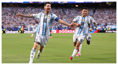Messi hits hat-trick as Argentina open title defence in style