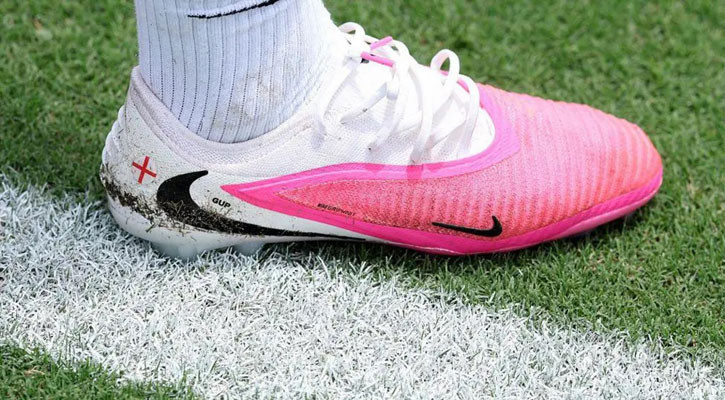 Why are footballers wearing pink boots at the World Cup?