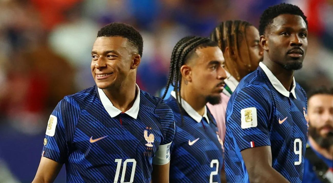France reach Round of 32 as Mbappe scores twice