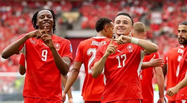 Switzerland top Group B after beating Canada, both advance